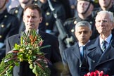 The Rt Hon Jeremy Hunt MP, Secretary of State for Foreign and Commonwealth Affairs, on behalf of the United Kingdom Overseas Territories and The Rt Hon The Lord Fowler, Lord Speaker, (on behalf of Parliament representing members of the House of Lords)   with their wreaths during the Remembrance Sunday Cenotaph Ceremony 2018 at Horse Guards Parade, Westminster, London, 11 November 2018, 10:57.