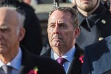 The Rt Hon Dr Liam Fox MP (Secretary of State for International Trade) during the Remembrance Sunday Cenotaph Ceremony 2018 at Horse Guards Parade, Westminster, London, 11 November 2018, 11:03.