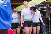 The Boat Race season 2017 -  The Cancer Research Women's Boat Race: The Cambridge crew carrying their boat from the boat house to the river, here 6 seat Alice White, 7 seat Myriam Goudet, and stroke Melissa Wilson.
River Thames between Putney Bridge and Mortlake,
London SW15,

United Kingdom,
on 02 April 2017 at 15:47, image #50