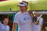 The Boat Race season 2017 -  The Cancer Research Women's Boat Race: CUWBC carrying the Cambridge boat from the boat house to the river, in front 4 seat Anna Dawson.
River Thames between Putney Bridge and Mortlake,
London SW15,

United Kingdom,
on 02 April 2017 at 15:47, image #54