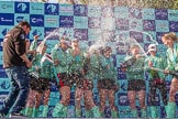 The Boat Race season 2017 -  The Cancer Research Women's Boat Race: CUWBC covered in spray (Cahmpagne, not Thames water) at the price giving.
River Thames between Putney Bridge and Mortlake,
London SW15,

United Kingdom,
on 02 April 2017 at 17:13, image #257