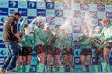 The Boat Race season 2017 -  The Cancer Research Women's Boat Race: CUWBC covered in spray (Cahmpagne, not Thames water) at the price giving.
River Thames between Putney Bridge and Mortlake,
London SW15,

United Kingdom,
on 02 April 2017 at 17:13, image #260