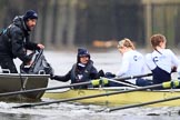 The Boat Race season 2018 - Women's Boat Race Trial Eights (OUWBC, Oxford): The "Coursing River" crew handing over clothes before the race - cox Ellie Shearer, stroke Beth Bridgman, 7 Juliette Perry. Who is the gentleman in the tin boat?.
River Thames between Putney Bridge and Mortlake,
London SW15,

United Kingdom,
on 21 January 2018 at 14:21, image #33