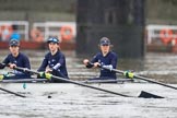 The Boat Race season 2018 - Women's Boat Race Trial Eights (OUWBC, Oxford): Rowing towards the start line in the rain - "Great Typhoon" with 3 Madeline Goss, 2 Laura Depner, bow Matilda Edwards.
River Thames between Putney Bridge and Mortlake,
London SW15,

United Kingdom,
on 21 January 2018 at 14:24, image #41