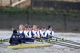 The Boat Race season 2018 - Women's Boat Race Trial Eights (OUWBC, Oxford): Rowing towards the start line in the rain - "Coursing River" with cox Ellie Shearer, stroke Beth Bridgman, 7 Juliette Perry, 6 Katherine Erickson, 5 Morgan McGovern, 4 Anna Murgatroyd, 3 Stefanie Zekoll, 2 Rachel Anderson, bow Sarah Payne-Riches.
River Thames between Putney Bridge and Mortlake,
London SW15,

United Kingdom,
on 21 January 2018 at 14:24, image #42