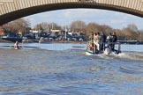 The Women's Boat Race season 2018 - fixture CUWBC vs. ULBC: ULBC, on the left, and CUWBC, in front of the umpire's boat, below Putney Bridge, rowuing towards their start positions.
River Thames between Putney Bridge and Mortlake,
London SW15,

United Kingdom,
on 17 February 2018 at 13:08, image #35