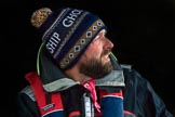 The Cancer Research UK Women's Boat Race 2018: CUWBC Head Coach Rob Baker in the shadow of a bridge.
River Thames between Putney Bridge and Mortlake,
London SW15,

United Kingdom,
on 24 March 2018 at 16:39, image #184