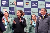 The Cancer Research UK Women's Boat Race 2018: The Women's Boat race presentation - Cambridge stroke Ollivia Coffey, Newton Investment CEO Hanneke Smits, hidden behind her 7 seat Myriam Goudet-Boukhatmi, 6 then Alice White, and Boat Race Company director Fergus Murison.
River Thames between Putney Bridge and Mortlake,
London SW15,

United Kingdom,
on 24 March 2018 at 17:07, image #264