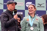 The Cancer Research UK Women's Boat Race 2018: BBC's Sport commentator Jason Mohammad with Cambridge 7 seat Myriam Goudet-Boukhatmi, behind them Cancer Research UK CEO Sir Harpal Kumar.
River Thames between Putney Bridge and Mortlake,
London SW15,

United Kingdom,
on 24 March 2018 at 17:07, image #266