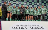 The Cancer Research UK Women's Boat Race 2018: The Women's Boat race trophy presentation - BBC Sport commentator Jason Mohammad, Myriam Goudet-Boukhatmi, Sophie Shapter, Olivia Coffey, Alice White, Boat Race Company director Fergus Murison, behind him Paula Wesselmann, then Thea Zabell, Kelsey Barolak, Imogen Grant, Tricia Smith, and CUWBC Head Coach Rob Baker.
River Thames between Putney Bridge and Mortlake,
London SW15,

United Kingdom,
on 24 March 2018 at 17:08, image #269