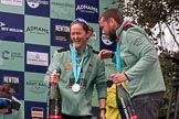 The Cancer Research UK Women's Boat Race 2018: Cambridge bow Tricia Smith, CUWBC Head Coach Rob Baker, Boat Race medals, and bottles of Chapel Down Brut.
River Thames between Putney Bridge and Mortlake,
London SW15,

United Kingdom,
on 24 March 2018 at 17:09, image #287