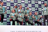 The Cancer Research UK Women's Boat Race 2018: The Cambridge women celebrating with their Boat Race medals, the Women's Boat Race trophy, and lots of Chapel Down Brut: Olivia Coffey  (with the trophy). Paula Wesselmann,  Thea Zabell, Kelsey Barolak, CUWBC Head Coach Rob Baker, and, on their knees, Alice White, Sophie Shapter, Imogen Grant, and Tricia Smith.
River Thames between Putney Bridge and Mortlake,
London SW15,

United Kingdom,
on 24 March 2018 at 17:09, image #295