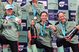 The Cancer Research UK Women's Boat Race 2018: The Cambridge women celebrating with their Boat Race medals and lots of Chapel Down Brut: Sophie Shapter, Imogen Grant, and Tricia Smith.
River Thames between Putney Bridge and Mortlake,
London SW15,

United Kingdom,
on 24 March 2018 at 17:09, image #296