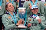 The Cancer Research UK Women's Boat Race 2018: The Cambridge women celebrating with their Boat Race medals, the Women's Boat Race trophy, and lots of Chapel Down Brut: Here Alice White, and Sophie Shapter.
River Thames between Putney Bridge and Mortlake,
London SW15,

United Kingdom,
on 24 March 2018 at 17:09, image #298