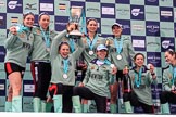 The Cancer Research UK Women's Boat Race 2018: The Cambridge women on the podium, with the Women's Boat Race trophy, their medals, and lots of Castle Down Brut: Myriam Goudet-Boukhatmi, Olivia Coffey, Alice White, Paula Wesselmann, The Zabell, Sophie Shapter, Kelsey Barolak , Imogen Grant, and Tricia Smith.
River Thames between Putney Bridge and Mortlake,
London SW15,

United Kingdom,
on 24 March 2018 at 17:09, image #299