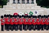 Trooping the Colour 2009: No. 3 Guard, 1st Battalion Irish Guards, presenting arms. Behind them the Guards Memorial..
Horse Guards Parade, Westminster,
London SW1,

United Kingdom,
on 13 June 2009 at 10:42, image #80