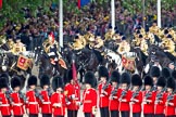 Trooping the Colour 2010: The Mounted Bands of the Life Guards and the Blues and Royals coming from Buckingham Palace, down the Mall and Horse Guards Road, onto Horse Guards Parade.

On the left in the photo spectators in St. James's Park.

Leading them, with the red plume on his helmet, Captain M E Fry, The Blues and Royals, Escort Commander.

The flags along the road are part of 63 flags, representing the states of the Commonwealth..
Horse Guards Parade, Westminster,
London SW1,
Greater London,
United Kingdom,
on 12 June 2010 at 10:56, image #48