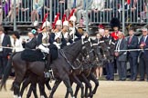 Trooping the Colour 2010: Four Troopers of the Blues and Royals (Royal Horse Guards and 1st Dragoons) riding, their swords drawn, following the Brigade Major Household Division, and leading the Royal Procession from Buckingham Palace to Horse Guards Parade.

In the photo, they are passing the spectators and stands in front of the Citadel on the eastern side of Horse Guards Parade..
Horse Guards Parade, Westminster,
London SW1,
Greater London,
United Kingdom,
on 12 June 2010 at 10:56, image #50