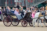 Trooping the Colour 2010: Her Majesty the Queen and The Prince Philip arriving on Horse Guards Parade in the Ivory Mounted Phaeton, built for Queen Victoria in 1842.

They are driving along the eastern side of the parade ground, next to the Old Admirality Building, spectators are watchin from the Inner Line Of Sentries, and one of the stands above..
Horse Guards Parade, Westminster,
London SW1,
Greater London,
United Kingdom,
on 12 June 2010 at 10:58, image #55