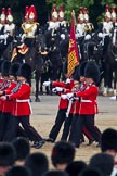 Trooping the Colour 2011: The Escort to the Colour. Carrying the flag in his white colour belt the ensign, Lieutenant Tom Ogilvy, and to his left, The Sergeant of the Ecort to the Colour, Colour Sergeant Chris Millin..
Horse Guards Parade, Westminster,
London SW1,
Greater London,
United Kingdom,
on 11 June 2011 at 11:43, image #268