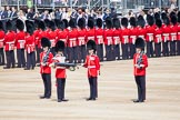 Trooping the Colour 2012: The uncasing the of Colour. With Colour Sergeant Paul Baines MC holding the flag, the Duty Drummer starts removing the colour case..
Horse Guards Parade, Westminster,
London SW1,

United Kingdom,
on 16 June 2012 at 10:32, image #78