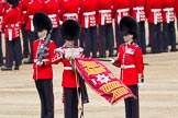 Trooping the Colour 2012: The uncasing the of Colour. With Colour Sergeant Paul Baines MC holding the flag, the Duty Drummer has removed the colour case..
Horse Guards Parade, Westminster,
London SW1,

United Kingdom,
on 16 June 2012 at 10:32, image #79