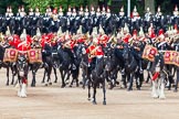 Major General's Review 2013: The Ride Past - the Mounted Bands of the Household Cavalry move, from the eastern side, onto Horse Guards Parade. The Director of Music of the Household Cavalry, Major Paul Wilman, The Life Guards followed by the kettle drummer from The Life Guards..
Horse Guards Parade, Westminster,
London SW1,

United Kingdom,
on 01 June 2013 at 11:50, image #580