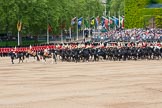 Major General's Review 2013: The Ride Past - the Mounted Bands of the Household Cavalry move, from the eastern side, onto Horse Guards Parade. The Director of Music of the Household Cavalry, Major Paul Wilman, The Life Guards followed by the kettle drummer from The Life Guards..
Horse Guards Parade, Westminster,
London SW1,

United Kingdom,
on 01 June 2013 at 11:50, image #576