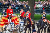 Trooping the Colour 2013: After the Inspection of the Line, the Glass Coach with HM The Queen turns back toward the dais for Her Majesty. Behind the Glass Coach the three Royal Colonels, HRH The Duke of Cambridge, Colonel Irish Guards, HRH The Prince of Wales, Colonel Welsh Guards, and HRH The Princess Royal, Colonel The Blues and Royals (Royal Horse Guards and 1st Dragoons)..
Horse Guards Parade, Westminster,
London SW1,

United Kingdom,
on 15 June 2013 at 11:06, image #356