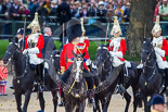 Trooping the Colour 2013: The Brigade Major Household Division Lieutenant Colonel Simon Soskin, Grenadier Guards, followed by the four Troopers of The Life Guard, after the Inspection of the Line. Image #350, 15 June 2013 11:06 Horse Guards Parade, London, UK