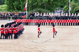 Trooping the Colour 2013: The men of No. 1 Guard (Escort for the Colour),1st Battalion Welsh Guards are moving into a new formation, facing the Coloir Party on the other side of Horse Guards Parade. In front the Ensign, Second Lieutenant Joel Dinwiddle, and the Subaltern, Captain F O Lloyd-George. Image #441, 15 June 2013 11:18 Horse Guards Parade, London, UK