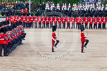 Trooping the Colour 2013: The men of No. 1 Guard (Escort for the Colour),1st Battalion Welsh Guards are moving into a new formation, facing the Coloir Party on the other side of Horse Guards Parade. In front the Ensign, Second Lieutenant Joel Dinwiddle, and the Subaltern, Captain F O Lloyd-George. Image #442, 15 June 2013 11:18 Horse Guards Parade, London, UK