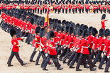 Trooping the Colour 2013: No. 1 Guard, the Escort to the Colour,1st Battalion Welsh Guards, during the March Past in Quick Time. Behind the Ensign is Regimental Sergeant Major, WO1 Martin Topps, Welsh Guards. Image #603, 15 June 2013 11:45 Horse Guards Parade, London, UK