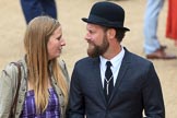 A couple, looking into each others eyes whilst walking, before Trooping the Colour 2018, The Queen's Birthday Parade at Horse Guards Parade, Westminster, London, 9 June 2018, 09:32.