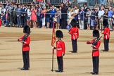 The Colour Sentry Guardsman Jonathon Hughes (26), Colour Sergeant Sam McAuley (31) holding the Colour, and the Colour Sentry Guardsman Sean Cunningham (21) during Trooping the Colour 2018, The Queen's Birthday Parade at Horse Guards Parade, Westminster, London, 9 June 2018, 10:38.